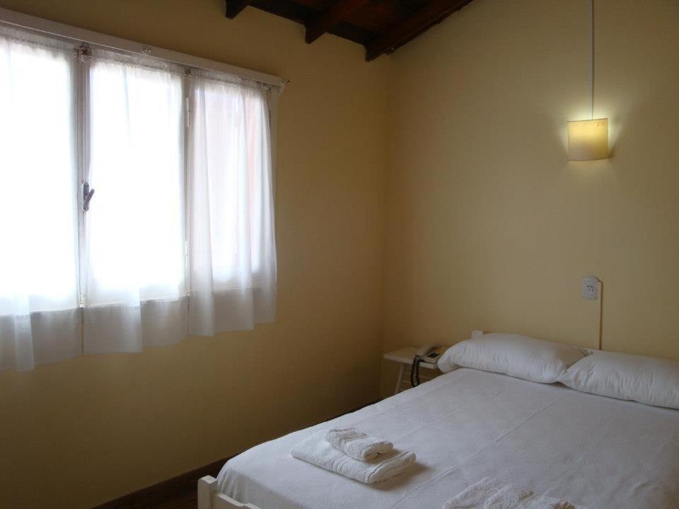 Hosteria Belvedere Pinamar Habitación foto